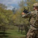 Army Reserve Staff Sgt. Philip Amick fires the M320 Grenade Launcher Module