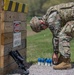 Army Reserve Sgt. Preston Hough picks up M320 Grenade Launcher Module chalk rounds