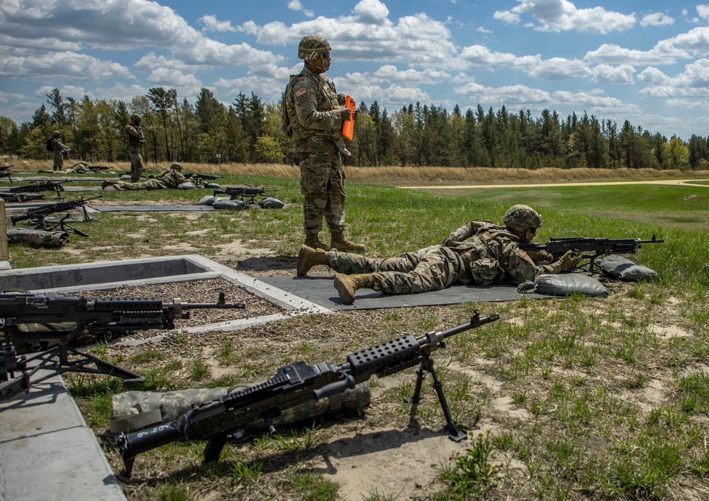 Army Reserve Best Squad Competitors fire the M249 Squad Automatic Weapon