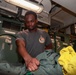 Abraham Lincoln Sailors restock ship's store