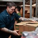 Abraham Lincoln Sailors restock ship's store