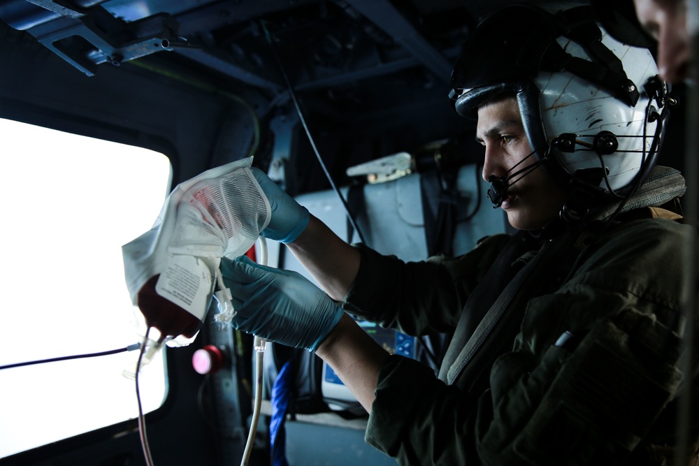 Sailors perform a simulated medevac