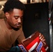 Abraham Lincoln Sailors restock ship's store