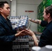 Abraham Lincoln Sailors restock ship's store