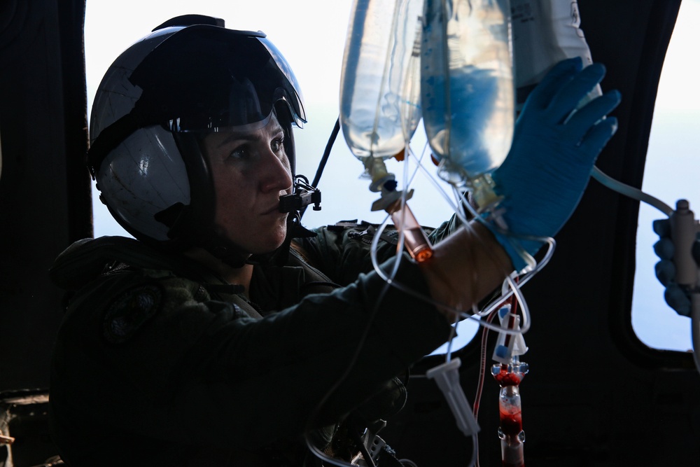 Sailors perform a simulated medevac