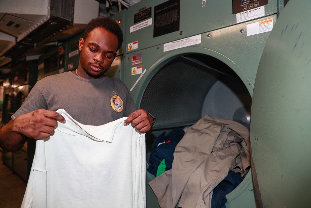 Abraham Lincoln Sailors restock ship's store
