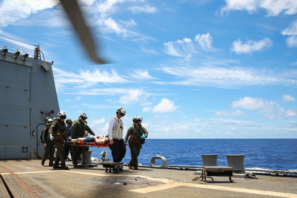 Sailors perform a simulated medevac