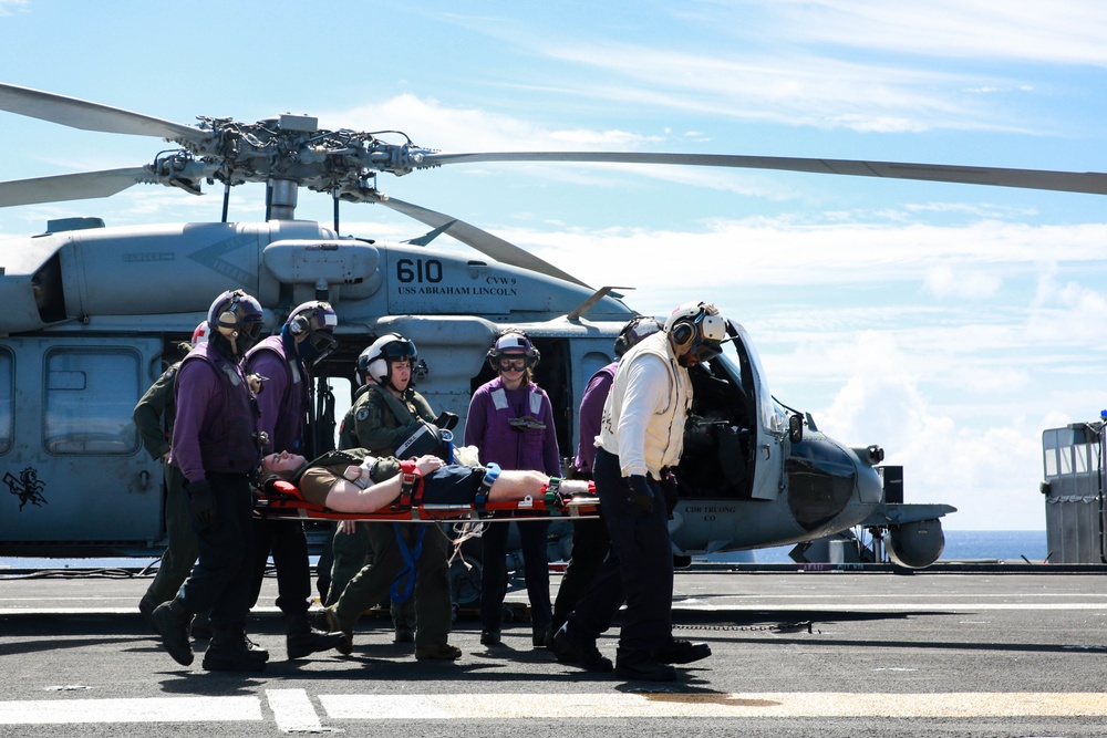 Sailors perform simulated medevac