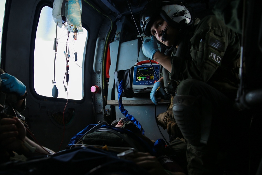 Sailors perform a simulated medevac