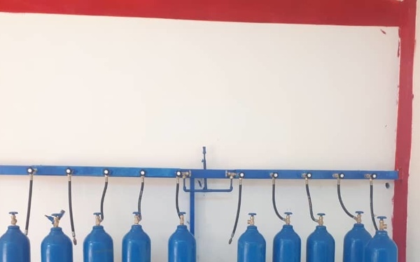 Oxygen tanks being filled at the oxygen bottling plant in DEZ established with USAID support.