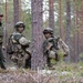 U.S. Army 1st Lt. Nicky Manitzas, right, and Staff Sgt. Ryan Cardiff, center, during Exercise Arrow 22