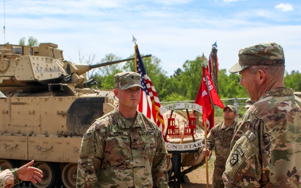 Soldier re-enlists at Poland with V Corps deputy commanding general