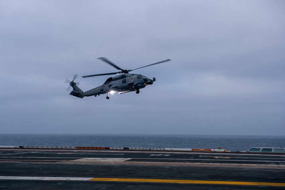 An MH-60R Prepares To Land On The Flight Deck