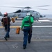 Sailors Run To Chalk Down MH-60R On The Flight Deck