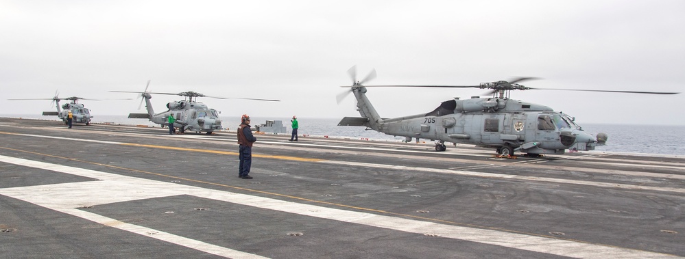 Three MH-60R Sea Hawks Rest On The Flight Deck