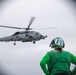 An MH-60R Sea Hawk Prepares To Land On The Flight Deck