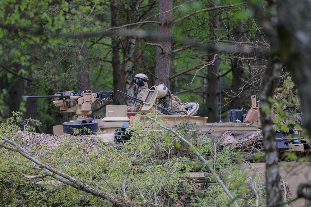 Polish and U.S. Soldiers Stage Vehicles Ahead of Multinational FTX