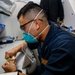 Abraham Lincoln Sailors perform dental procedures