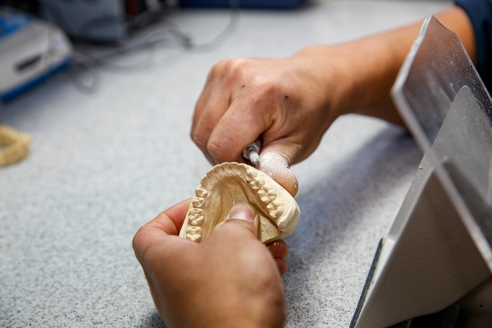 Abraham Lincoln Sailors perform dental procedures