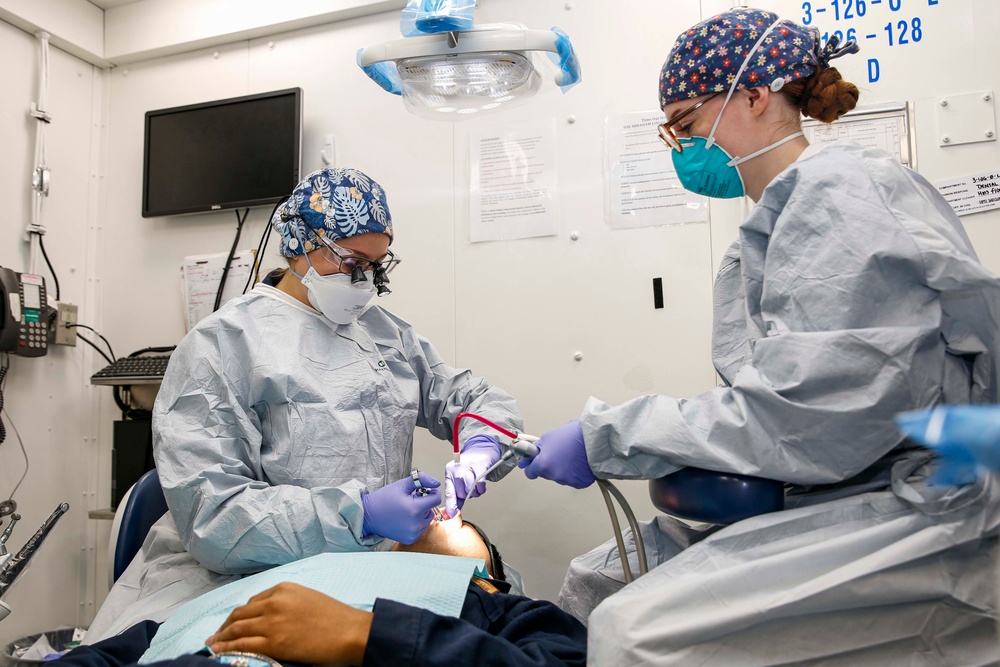 Abraham Lincoln Sailors perform dental procedures