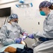 Abraham Lincoln Sailors perform dental procedures