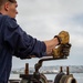 Sailors Remove an Aircraft Catapult