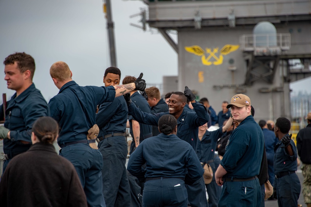 Sailors Remove an Aircraft Catapult