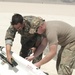 Joint service EOD techs join forces to destroy 12,000-pound missile cache