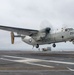 A C-2 Greyhound Makes An Arrested Gear Landing On The Flight Deck