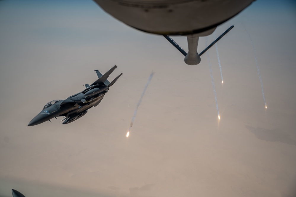 U.S. Air Force KC-135 refuels F-15s