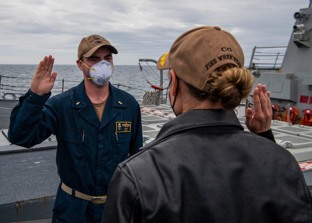 Gridley conducts a promotion ceremony on the ship's forecastle