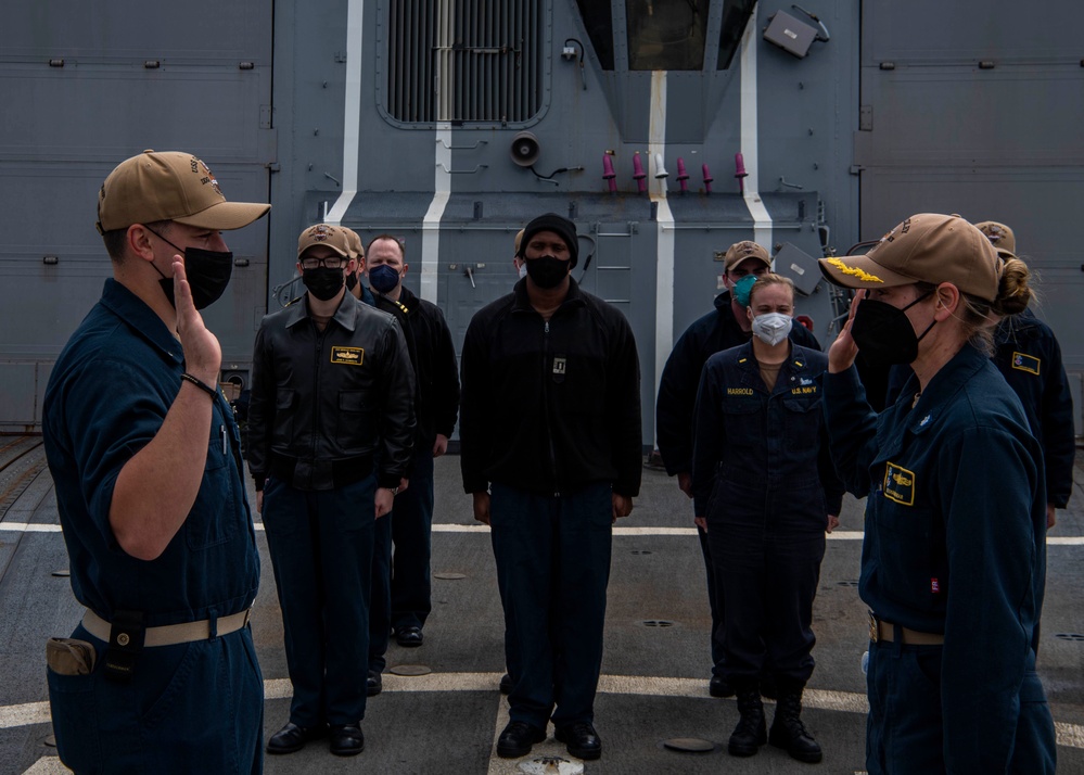 Gridley conducts a promotion ceremony on the ship's flight deck