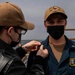 Gridley conducts a promotion ceremony on the ship's flight deck