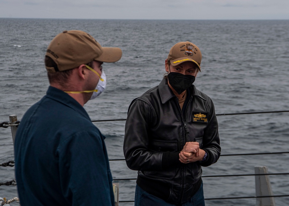 Gridley conducts a promotion ceremony on the ship's forecastle