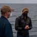 Gridley conducts a promotion ceremony on the ship's forecastle