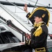 Commanding Officer waves after a 21-gun salute