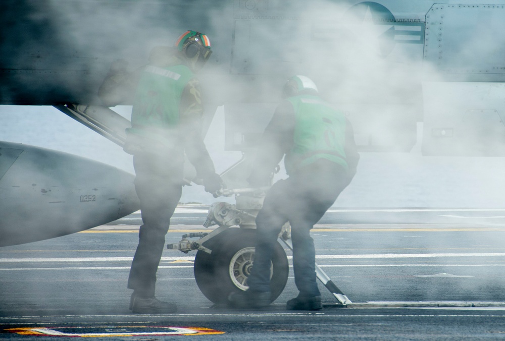 Sailors Attach An FA/18F To A Catapult