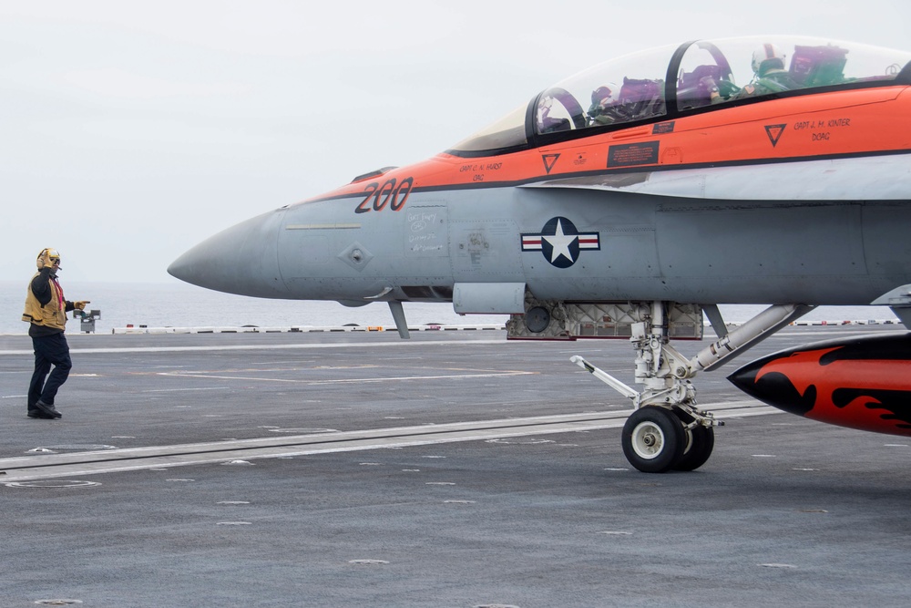 An FA-18F Super Hornet Taxis On The Flight Deck