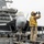 Sailor Directs An F/A-18E Super Hornet