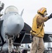 Sailor Directs An F/A-18E Super Hornet