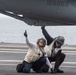 Sailors Complete A Safety Check On An FA/18E Super Hornet