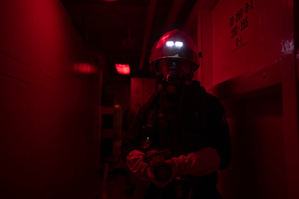 Sailor Maintains Fire Boundary During Drill