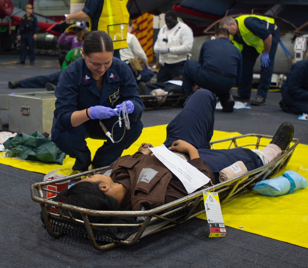 Sailor Prepares IV Line For Casualty