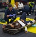 Sailor Prepares IV Line For Casualty