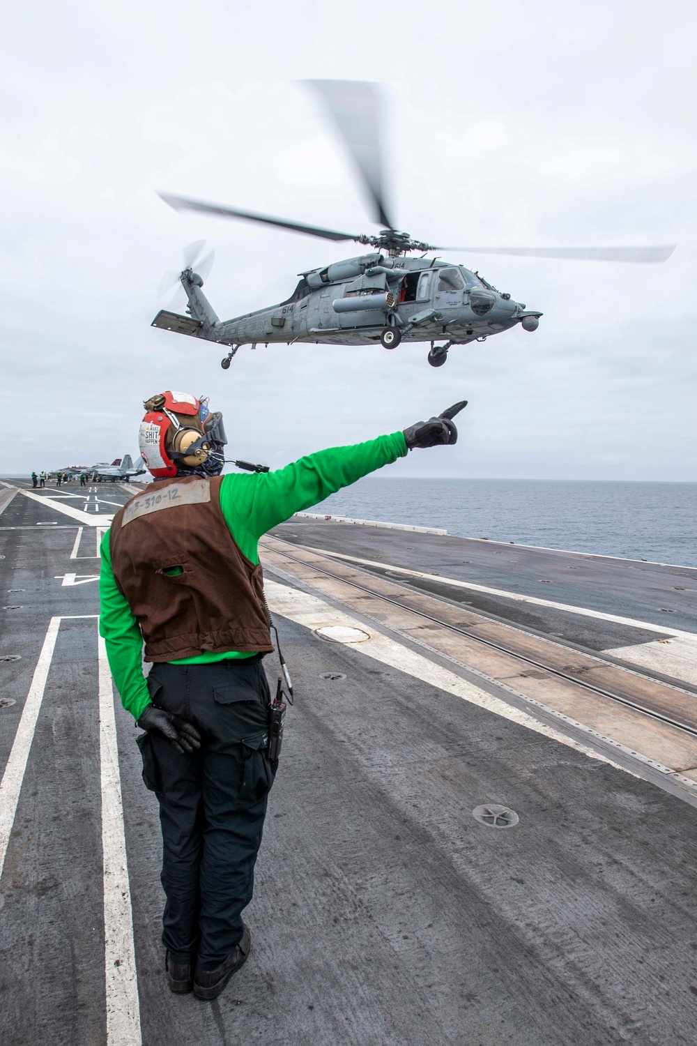 An MH-60S Lifts Off Of The Flight Deck