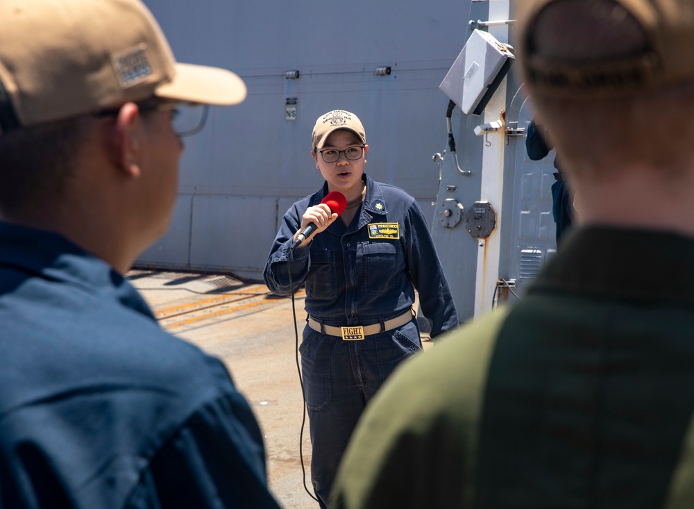 Sailors Aboard USS Dewey (DDG 105) Conduct Awards Quarters