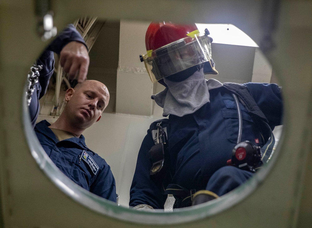 Sailors Aboard USS Dewey (DDG 105) Conduct Damage Control Training