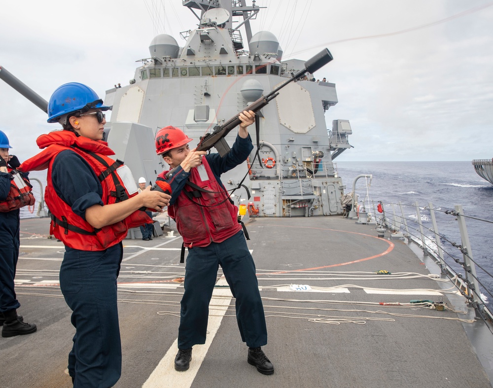 Sailors Aboard USS Dewey (DDG 105) Conduct Replenishment-at-Sea with USNS Tippecanoe (T-AO-199)