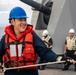 Sailors Aboard USS Dewey (DDG 105) Conduct Replenishment-at-Sea with USNS Tippecanoe (T-AO-199)