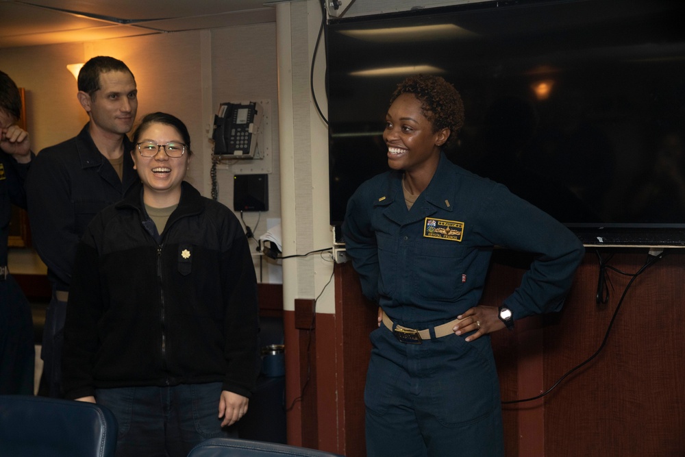 Sailor Receives Surface Warfare Officer Pin Aboard USS Dewey (DDG 105)